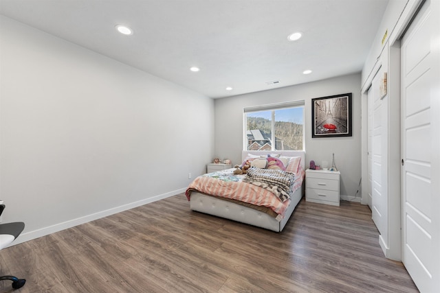 11625 N Alberta Ln, Spokane, WA 99218 - bedroom with wood finished floors and recessed lighting