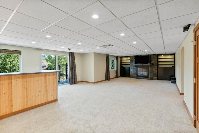 711 W Bolan Ave, Spokane, WA 99224 - unfurnished living room featuring a fireplace, light colored carpet, and recessed lighting