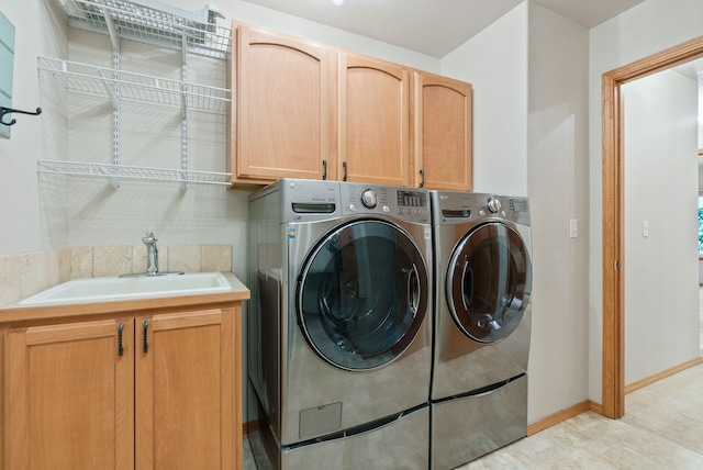 711 W Bolan Ave, Spokane, WA 99224 - laundry area with cabinet space and washer and dryer