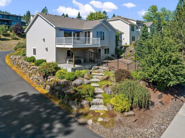 711 W Bolan Ave, Spokane, WA 99224 - rear view of house featuring a patio area, a deck, and roof with shingles