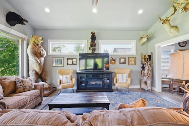 5159 W Village Blvd, Rathdrum, ID 83858 - living area featuring plenty of natural light, wood finished floors, and recessed lighting