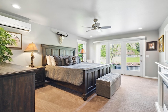 5159 W Village Blvd, Rathdrum, ID 83858 - bedroom featuring an AC wall unit, access to exterior, light carpet, recessed lighting, and a ceiling fan