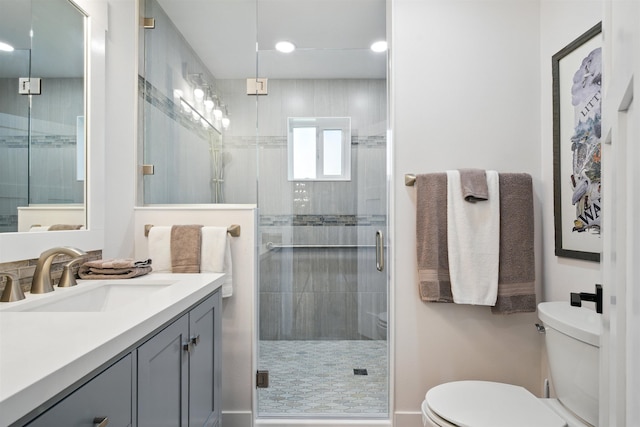 5159 W Village Blvd, Rathdrum, ID 83858 - bathroom featuring vanity, a shower stall, and recessed lighting