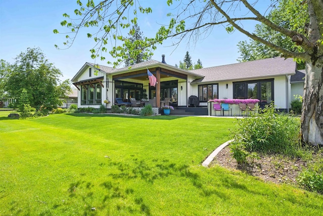 5159 W Village Blvd, Rathdrum, ID 83858 - back of house with a yard
