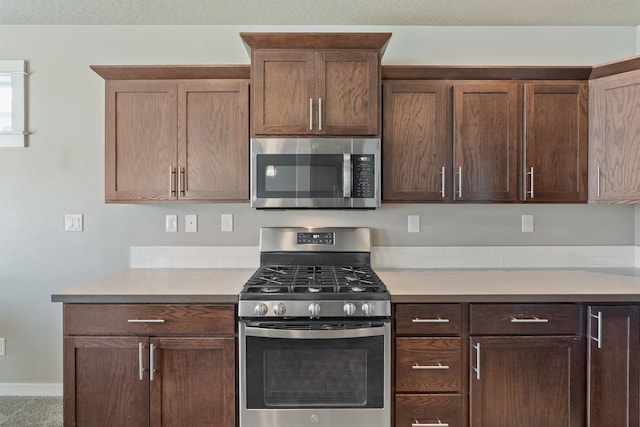 1101 S Pillar Rock Dr, Spokane, WA 99224 - kitchen featuring stainless steel appliances and light countertops
