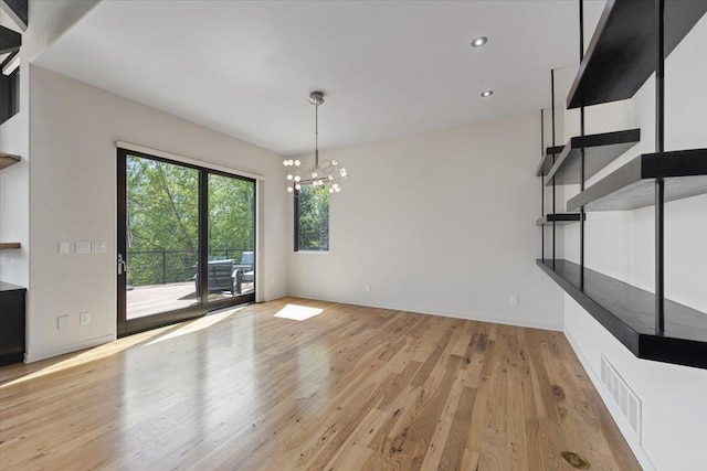 2503 S Thierman Ln, Spokane, WA 99223 - unfurnished dining area with a chandelier, light wood-style flooring, and recessed lighting