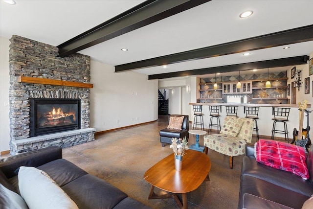 2503 S Thierman Ln, Spokane, WA 99223 - living area featuring beam ceiling, a stone fireplace, and recessed lighting