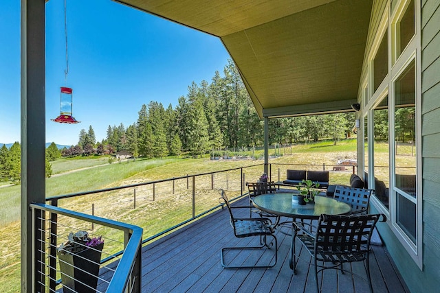 9510 N Doak Rd, Spokane, WA 99217 - wooden deck featuring a lawn