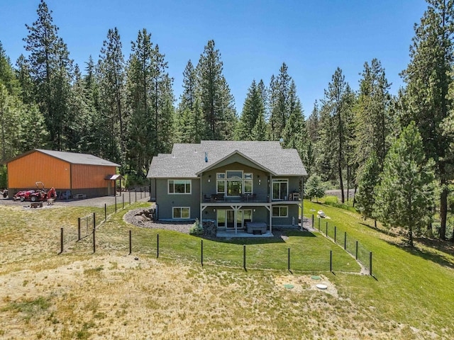 9510 N Doak Rd, Spokane, WA 99217 - rear view of house featuring a fenced backyard and a balcony