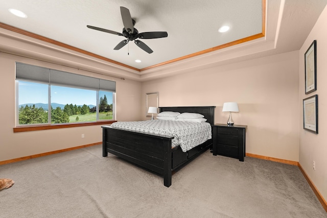 9510 N Doak Rd, Spokane, WA 99217 - carpeted bedroom featuring a tray ceiling, recessed lighting, and ceiling fan