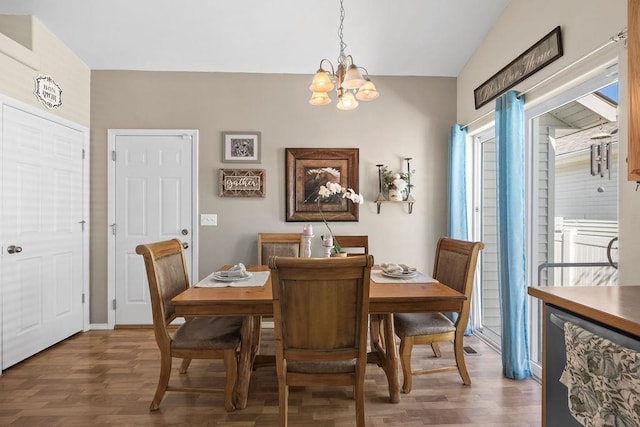 8910 N Oak St, Spokane, WA 99208 - dining room with a chandelier, wood finished floors, and lofted ceiling