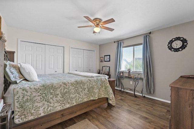8910 N Oak St, Spokane, WA 99208 - bedroom featuring multiple closets, dark wood-type flooring, and a ceiling fan