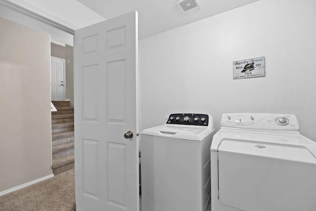 8910 N Oak St, Spokane, WA 99208 - laundry area featuring washer and clothes dryer and carpet