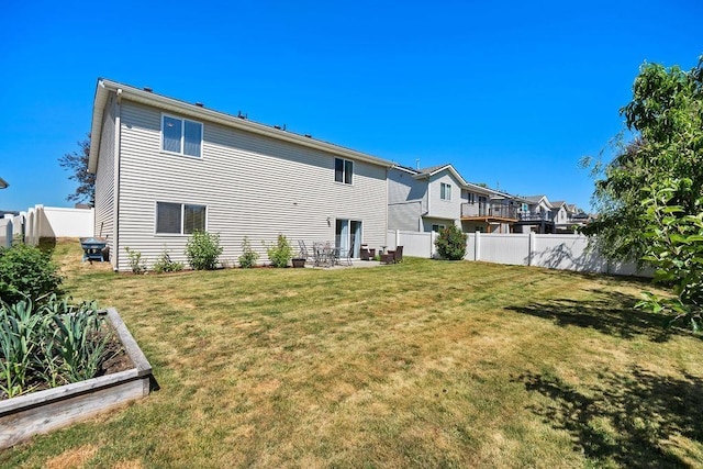 8910 N Oak St, Spokane, WA 99208 - rear view of house featuring a fenced backyard and a residential view