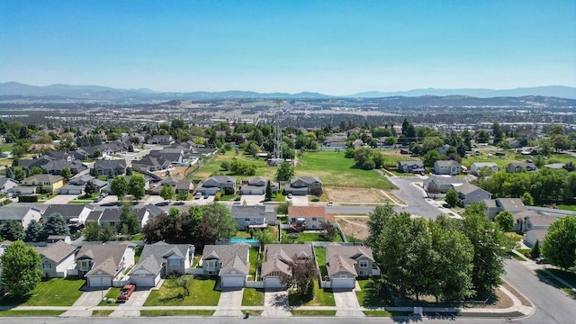 8910 N Oak St, Spokane, WA 99208 - aerial perspective of suburban area with a mountain backdrop