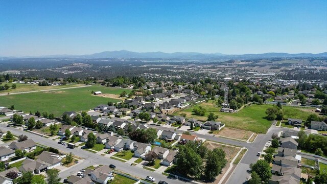 8910 N Oak St, Spokane, WA 99208 - aerial overview of property's location featuring mountains