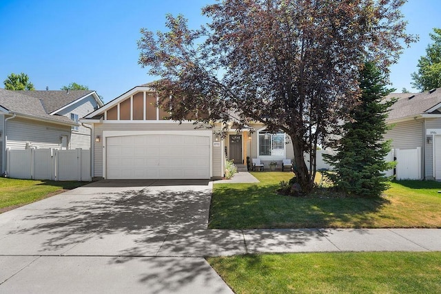 8910 N Oak St, Spokane, WA 99208 - view of property hidden behind natural elements featuring a garage and concrete driveway
