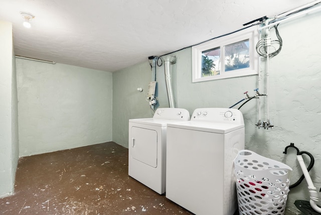 4910 N A St, Spokane, WA 99205 - washroom with a textured wall and washer and dryer