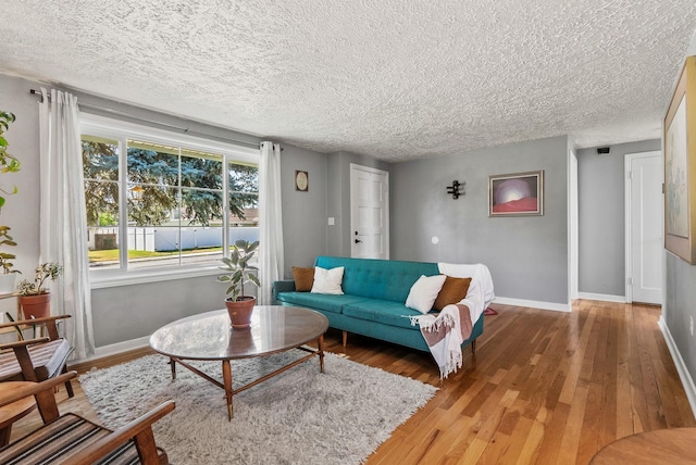 4910 N A St, Spokane, WA 99205 - living area featuring wood finished floors and a textured ceiling