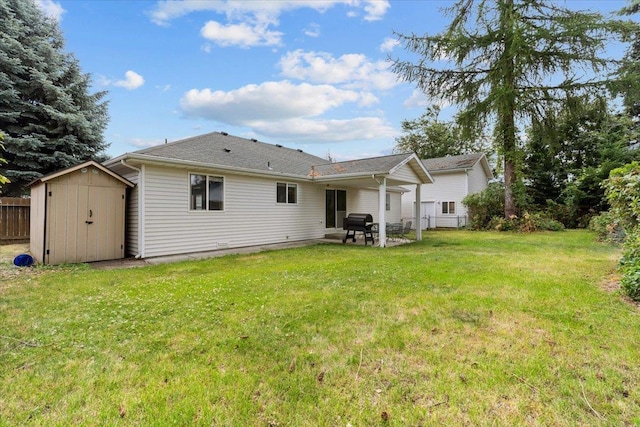 9301 N Drawbridge Ct, Hayden, ID 83835 - back of property featuring a patio and a storage shed