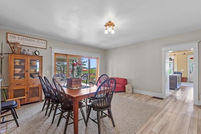 28752 Tramm Rd, Reardan, WA 99029 - dining space with crown molding and light wood-type flooring