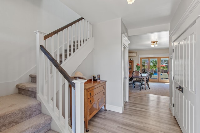 28752 Tramm Rd, Reardan, WA 99029 - stairs featuring wood finished floors and french doors