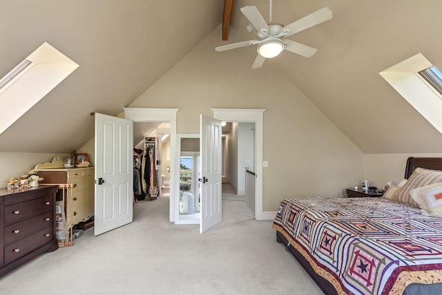 28752 Tramm Rd, Reardan, WA 99029 - bedroom featuring a skylight, light colored carpet, a spacious closet, and ceiling fan