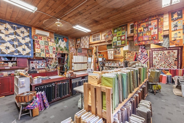 28752 Tramm Rd, Reardan, WA 99029 - misc room featuring carpet flooring, wood ceiling, and a wall mounted AC