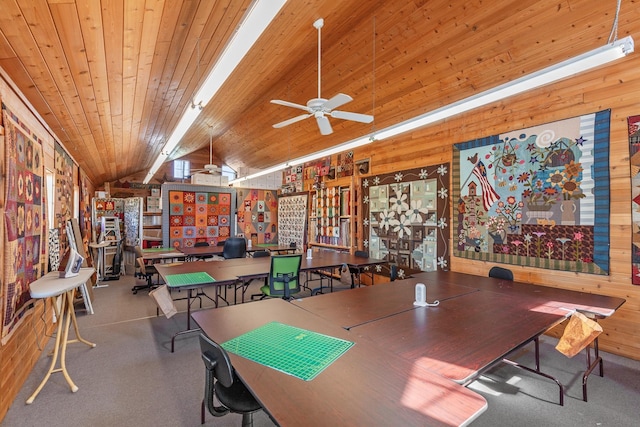 28752 Tramm Rd, Reardan, WA 99029 - carpeted dining area featuring wood walls, a desk, wood ceiling, and a ceiling fan