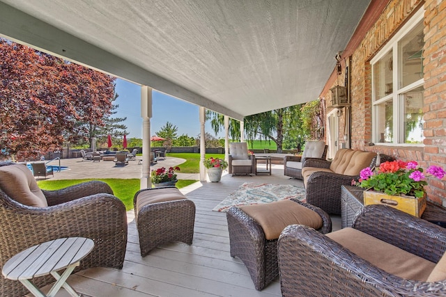 28752 Tramm Rd, Reardan, WA 99029 - wooden terrace with outdoor lounge area and a patio
