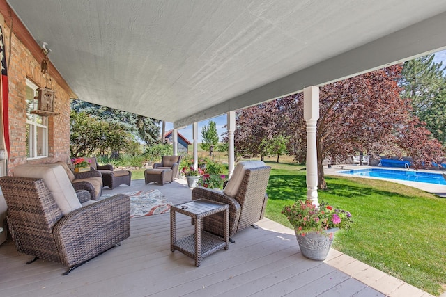 28752 Tramm Rd, Reardan, WA 99029 - wooden deck with outdoor lounge area, an outdoor pool, and a lawn