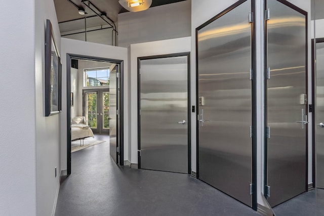 2230 W Riverside Ave # 302, Spokane, WA 99201 - kitchen with french doors and baseboards