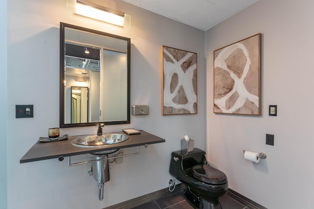 2230 W Riverside Ave # 302, Spokane, WA 99201 - bathroom with a sink and tile patterned floors