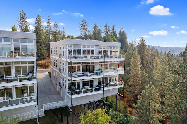 2230 W Riverside Ave # 302, Spokane, WA 99201 - view of property featuring a view of trees