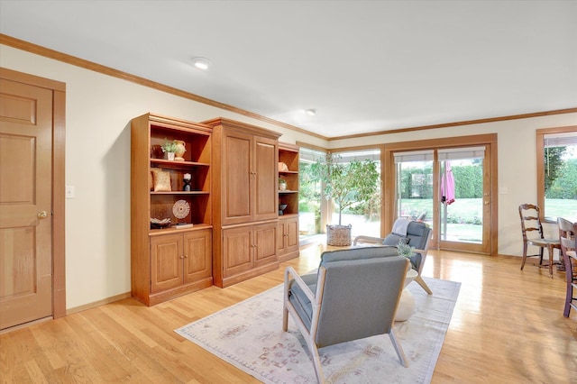 4402 S Saint Andrews Ln, Spokane, WA 99223 - living area with light wood-type flooring and crown molding