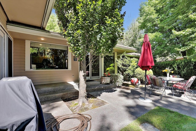 4402 S Saint Andrews Ln, Spokane, WA 99223 - view of patio / terrace with outdoor dining space and area for grilling