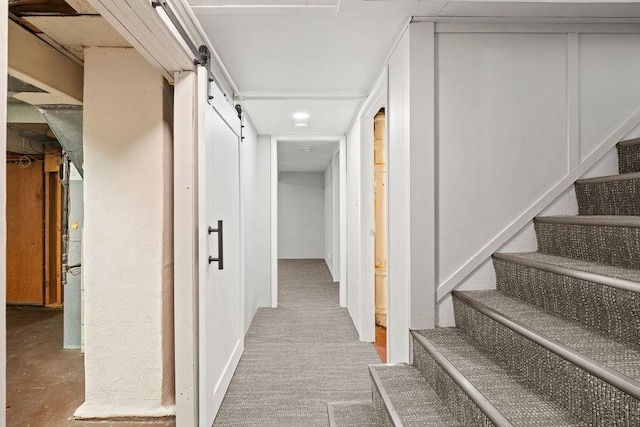 3307 W Euclid Ave, Spokane, WA 99205 - hallway featuring stairway, a barn door, and recessed lighting