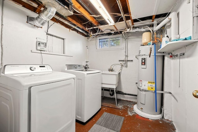 3307 W Euclid Ave, Spokane, WA 99205 - laundry area with water heater and washing machine and clothes dryer