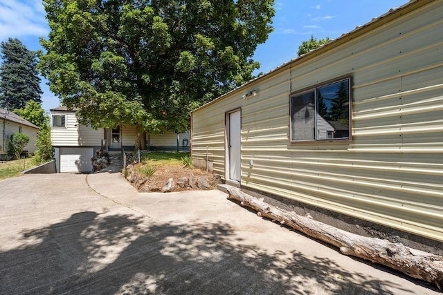 3307 W Euclid Ave, Spokane, WA 99205 - view of side of home with driveway and a garage