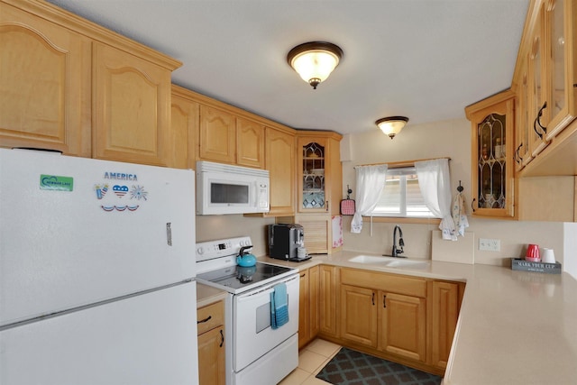 22704 E Park Beach Rd, Newman Lake, WA 99025 - kitchen featuring white appliances, light countertops, and glass insert cabinets