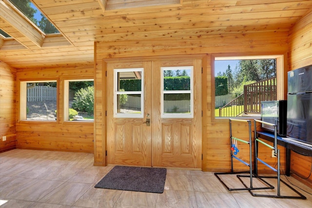 10612 E 46th Ave, Spokane Valley, WA 99206 - doorway to outside featuring wooden ceiling, wood walls, and a skylight