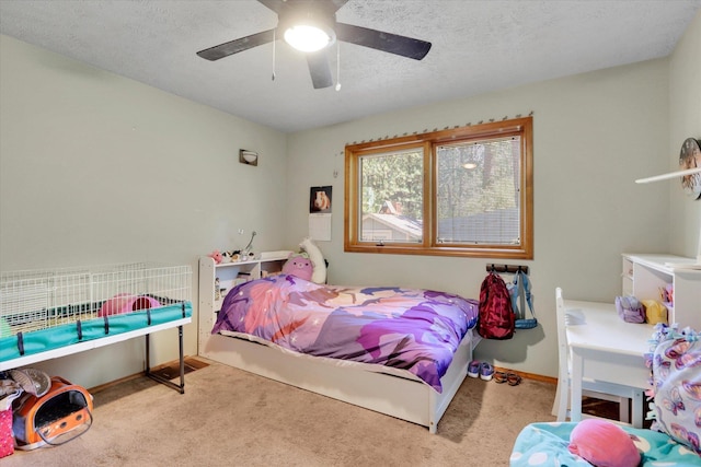 10612 E 46th Ave, Spokane Valley, WA 99206 - bedroom with carpet flooring, a ceiling fan, and a textured ceiling