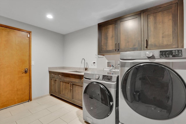 10612 E 46th Ave, Spokane Valley, WA 99206 - washroom featuring washer and dryer, cabinet space, and recessed lighting