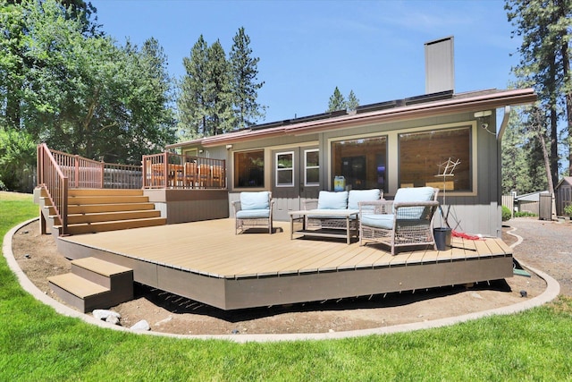 10612 E 46th Ave, Spokane Valley, WA 99206 - back of house with a deck, an outdoor living space, stairway, and a chimney