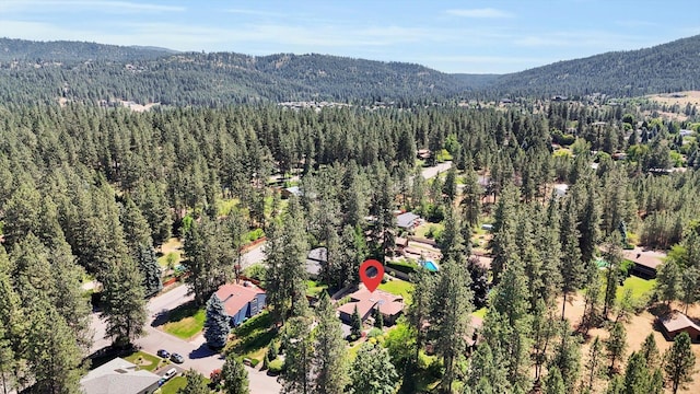 10612 E 46th Ave, Spokane Valley, WA 99206 - view of property location featuring a forest and mountains