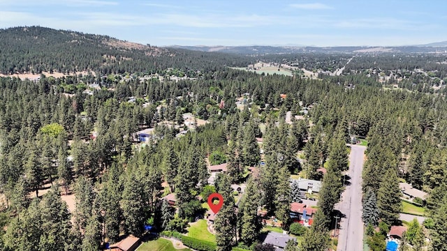 10612 E 46th Ave, Spokane Valley, WA 99206 - aerial view of a heavily wooded area and a mountain backdrop