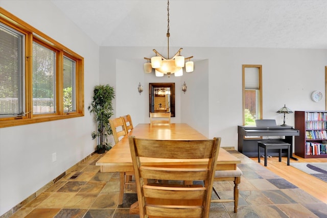 10612 E 46th Ave, Spokane Valley, WA 99206 - dining space with stone finish floors and vaulted ceiling