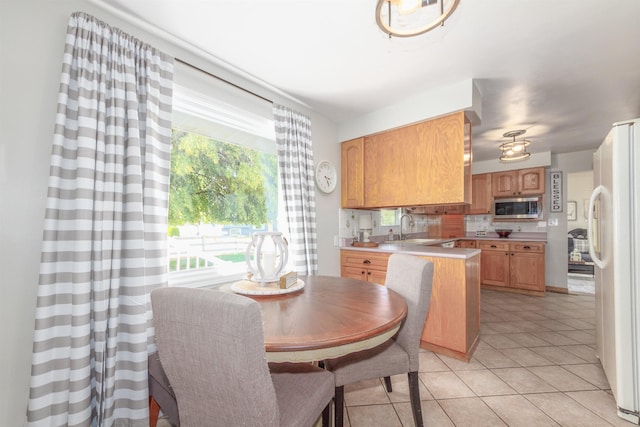 1018 N Fox Rd, Spokane Valley, WA 99206 - dining area with light tile patterned flooring