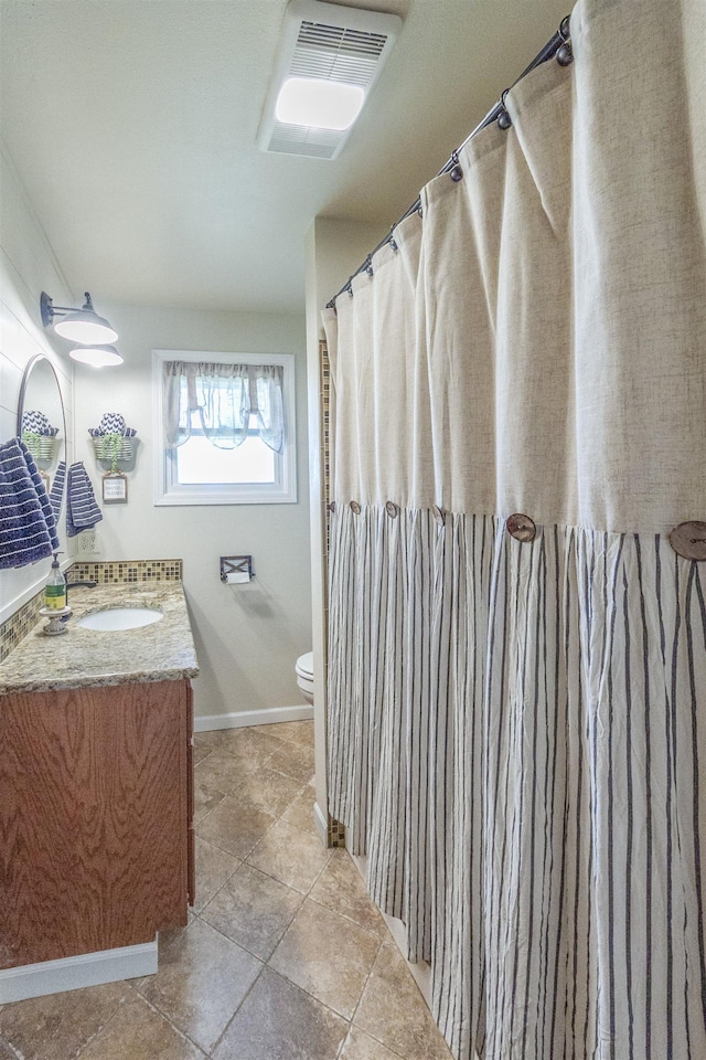1018 N Fox Rd, Spokane Valley, WA 99206 - bathroom with vanity and toilet