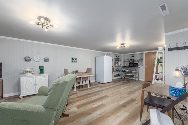 1018 N Fox Rd, Spokane Valley, WA 99206 - living area featuring light wood finished floors and ornamental molding